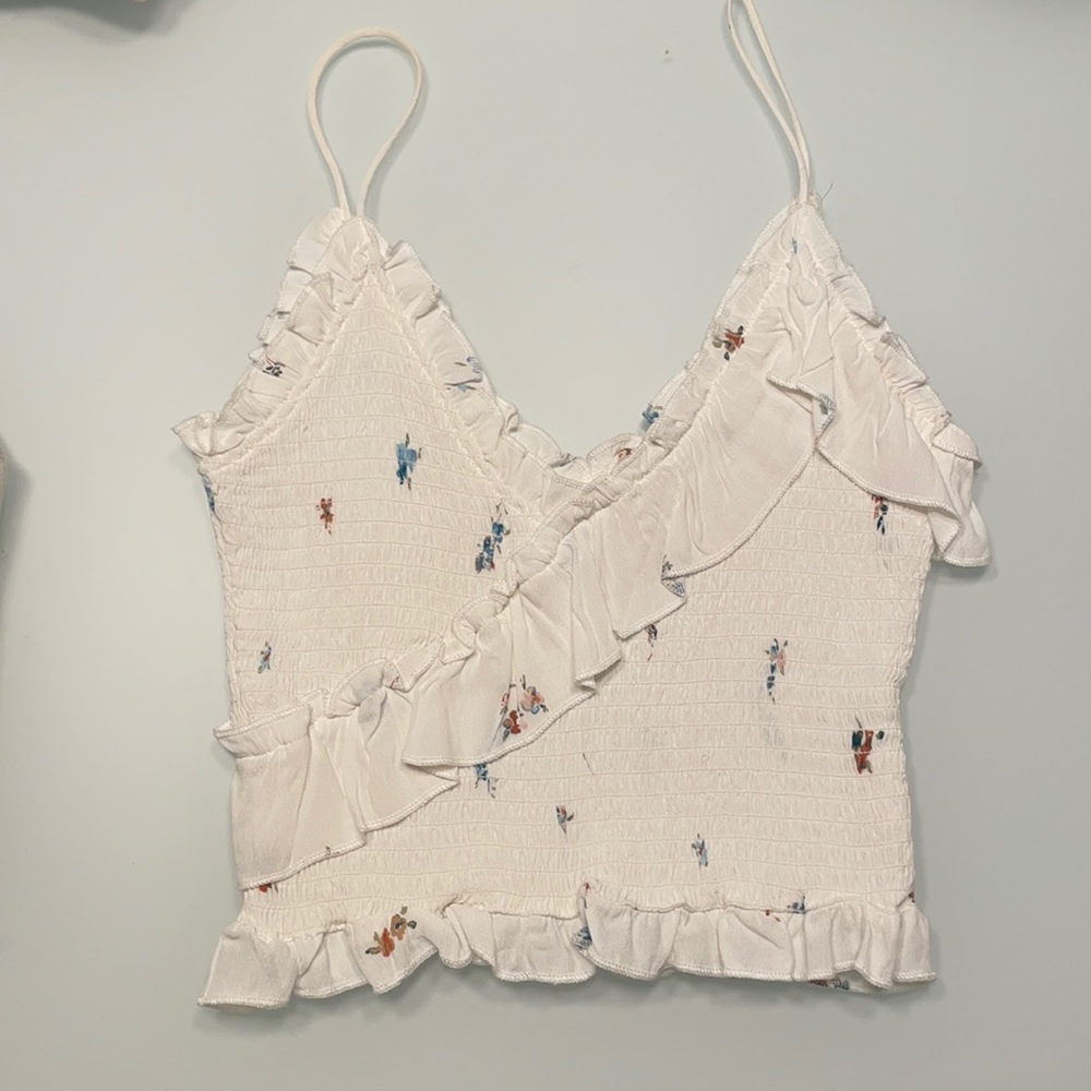 White rouched ruffle tank top with floral design